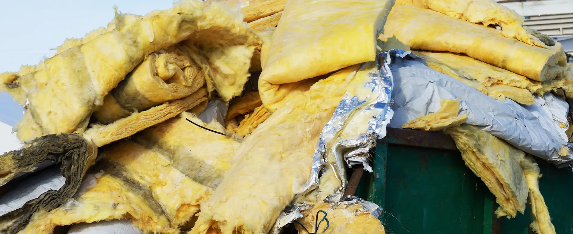 Insulation Removal project material in a framed building